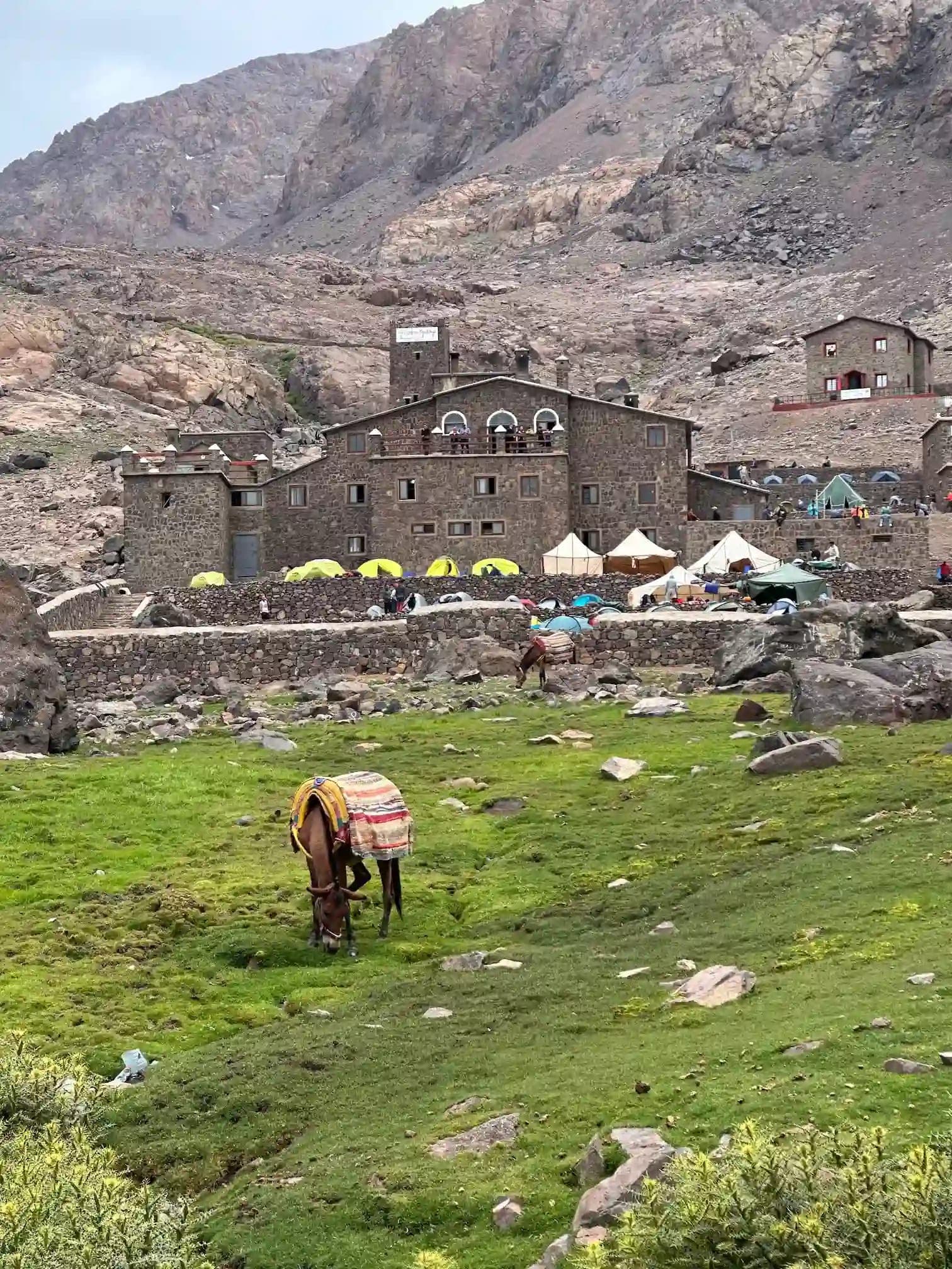 Hikers training on a steep trail during a guided Mount Toubkal trek